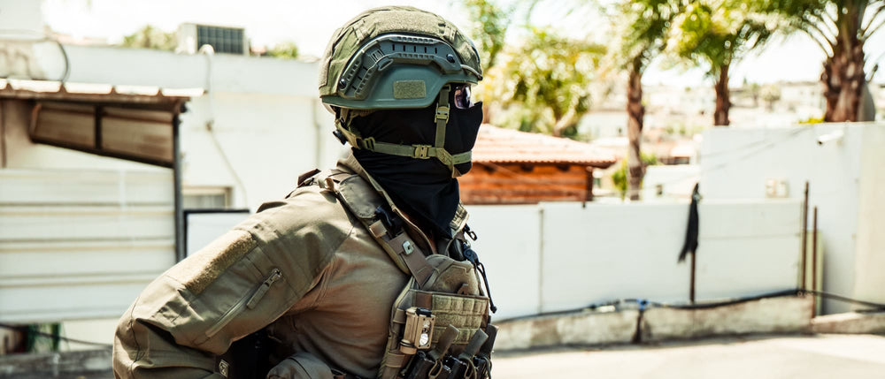 Operator wearing a plate carrier and helmet