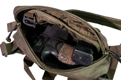 
תיק Pistol Pack פתוח ובתוכו אקדח